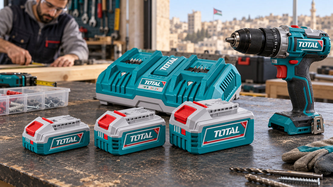 20V lithium batteries in different sizes with a dual charger and a cordless drill on a workbench